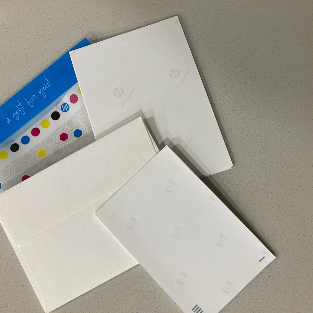 HP product set of photo paper and envelopes